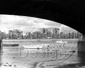 Beneath Waterloo Bridge facing the Thames Embankment and Cleopatra's Needle in London c1930s