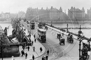 Vehicles on Westminster Bridge in London c1900s