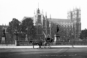 Westminster Abbey from across Parliament Square with a Hansom Cab in the forefront in London c1890s